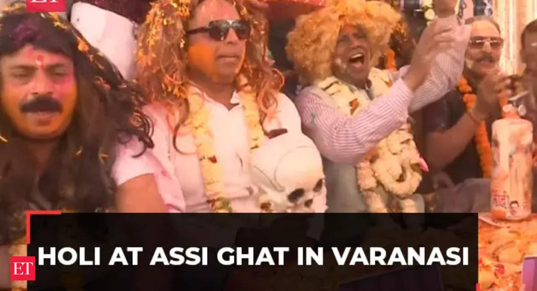 Uttar Pradesh: People celebrates Holi at Assi Ghat in Varanasi, watch! – The Economic Times Video